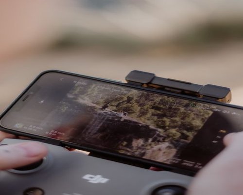 Smartphone displaying the fictional Crown Ember Quest adventure on CrownQuestForge Australia